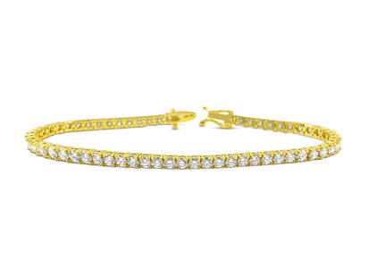 6.25ct Diamond Tennis Braclet. VVS Diamonds in 14k Gold: Metal: 14k yellow gold. 6.25 CWT diamonds. VVS clarity. H-I color. Round brilliant cut diamonds. 100% natural earth mined diamonds. 7 inches. Unisex diamond tennis bracelet Reserve: $6,720.00 