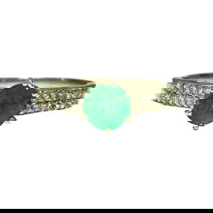 14K gold, 0.50 carat Colombian Emerald and Diamond Ring: Metal: 14K white Gold. 0.50 CT round cut Colombian Emerald. VS-SI clarity and G color diamonds. Round brilliant cut diamonds. 100% natural earth mined diamonds. Reserve: $1,340.00 