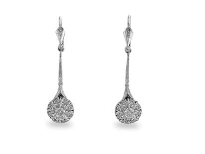 Vintage, 18k White Gold & Diamond Dangle Earrings: Metal: 18k white gold. 0.50 CWT diamonds. Round brilliant cut center diamond and rose cut side diamonds. VS clarity and G color diamonds. The rose cut originated in the 1500's and was commonly used