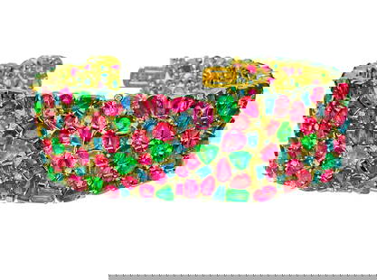 Mughal Empire: Burma Ruby, Emerald & Sapphire Bracelet: Metal: 18K yellow gold. Gemstones: Burma ruby, Colombian emerald, and blue sapphire. Total carat weight of gemstones: Over 200 carats. Mixed fancy cut gemstones. All stones are 100% natural earth