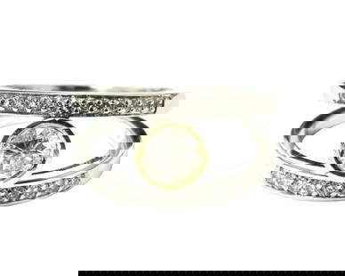 Vintage 14K two tone, 0.76ct Diamond Engagement Ring: Metal: 14k white & rose gold. Diamonds; 0.53ct center and 0.23ct side. Total carat weight of 0.76 carat diamonds. SI1-SI2 clarity and F-G color. Round brilliant cut diamonds. 100% natural earth mined