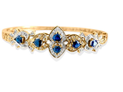 Vintage 2.00 Carat Blue Sapphire Diamond Bracelet: Metal: 14K yellow gold. 2.00 ct blue sapphire total. 100% natural earth mined. Heart shaped blue sapphire. 100% natural earth mined side diamonds. Round brilliant diamonds. Nice shine and luster.
