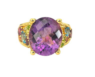 Multi gemstone Ring in 14k yellow Gold: Metal: 14k yellow gold. 8.50ct amethyst, oval shape. Side gemstone: amethyst, green peridot, aquamrine and rubelite, 2.60cwt. Side diamond: 0.13cwt, VS clarity, F-G color. Total weight: 9.5 grams.