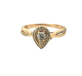 Pear Motif Rose Gold Ring: Metal: 10k rose gold. 0.70cwt dimaonds. SI2 clarity, G color. Total weight: 2.1 grams. Vintage rose gold ring Reserve: $425.00 Shipping:Domestic: Shipping rates are determined by