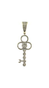 Key Motif Pendant With Diamonds in 14k Gold: Metal: 14k yellow gold. 0.50cwt diamonds. SI2/I1 clarity, G-H color. All stones are 100% natural earth mined. Measurements: 1.7 x 0.50 inches. Total weight: 3.6 grams. Vintage diamond pendant. 