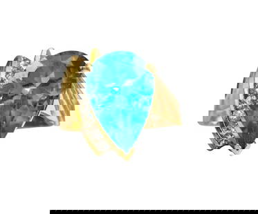 5.80 Carat Topaz & Diamond Ring in 10k Gold: Metal: 10k yellow gold. Center stone: 5.80 carat blue topaz, pear shape Side diamonds: 0.21 carat, SI1 clarity, G-H color. All stones are 100% natural earth mined. 6.7 grams total. Ring size: US 9.