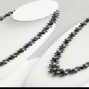 12-14mm Tahitian Dark Near-Round Pearl Necklace with 14k Clasp: Title: 12-14mm Tahitian Dark Near-Round Pearl Necklace with 14k Clasp Description: AAA Qualilty, Tahitian Dark Near-Round Pearl Necklace, 31 pearl pieces, 18 inches hand-knotted with 14k fish-hook cla