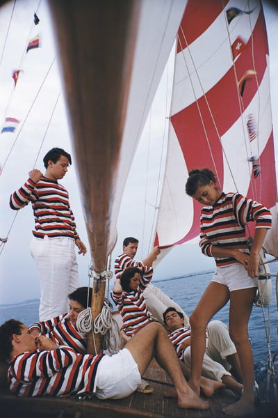 Adriatic Sailors ' By Slim Aarons Oversized C Type: Description ' Adriatic Sailors ' by Slim Aarons Premium Rates Apply. Young holidaymakers from Milan enjoy a sail on the Adriatic, 1956. (Photo by Slim Aarons/Hulton Archive/Getty Images) Paper size 40