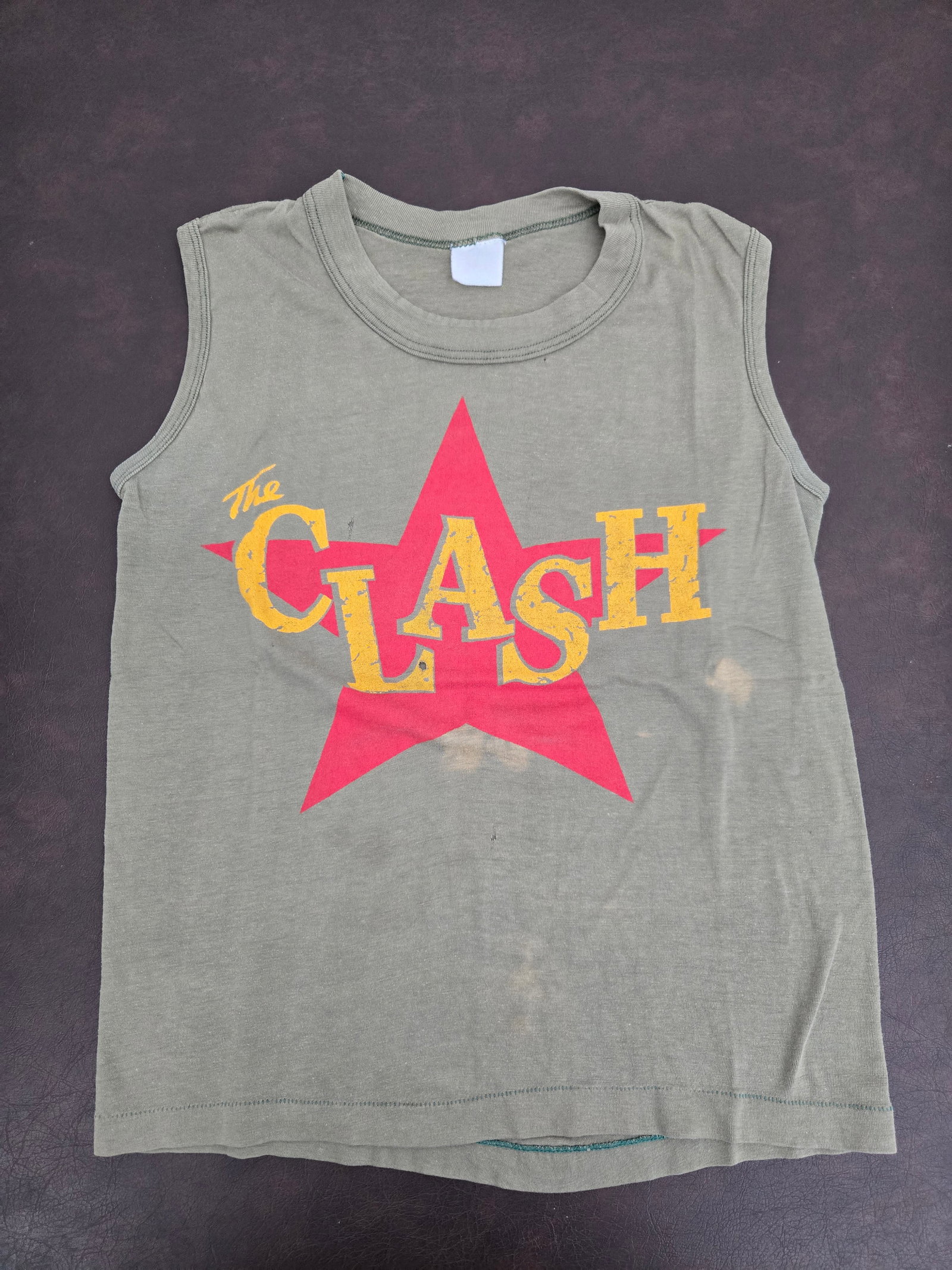 Vintage 80's The CLASH Green Shirt: Title: Vintage 80's The CLASH Green Shirt Origin: USA Date/Period: 80's Material: Cotton Size/Dimensions: S Description: Pre-Owned, Vintage, Might have stains due aging and storage. Reserve: $150.00 S