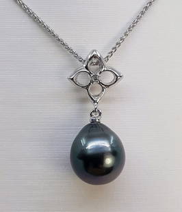 Pendant - 14 kt. White gold - 0.01ct. tw. - 10x11mm Tahitian Pearl: Title: Pendant - 14 kt. White gold - 0.01ct. tw. - 10x11mm Tahitian Pearl Description: Emerging from the tropical lagoons of French Polynesia, this pearl has been selected for its natural remarkable g