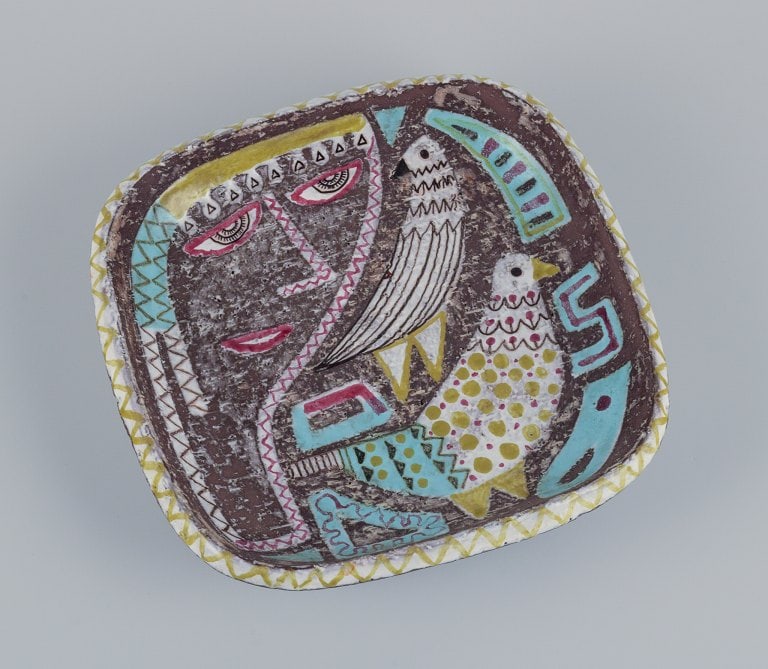 Mari Simmulson (1911-2000) for Upsala Ekeby, Sweden. Ceramic bowl with polychrome glaze. Featuring a: Mari Simmulson (1911-2000) for Upsala Ekeby, Sweden. Ceramic bowl with polychrome glaze. Featuring a motif of a woman's face and a bird. Model 4068. Approximately 1960. Marked. In perfect condition. D