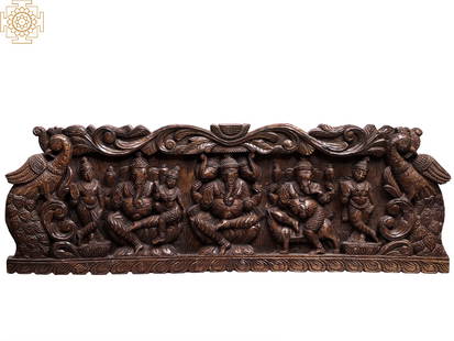 41" Large Wooden Wall Panel of Lord Ganesha in Different Forms: Title: 41" Large Wooden Wall Panel of Lord Ganesha in Different Forms Description: Wood Height: 13 inch Width: 41 inch Depth: 2 inch Weight: 7.08 kg Additional Information: Images of Ganesha in sacred