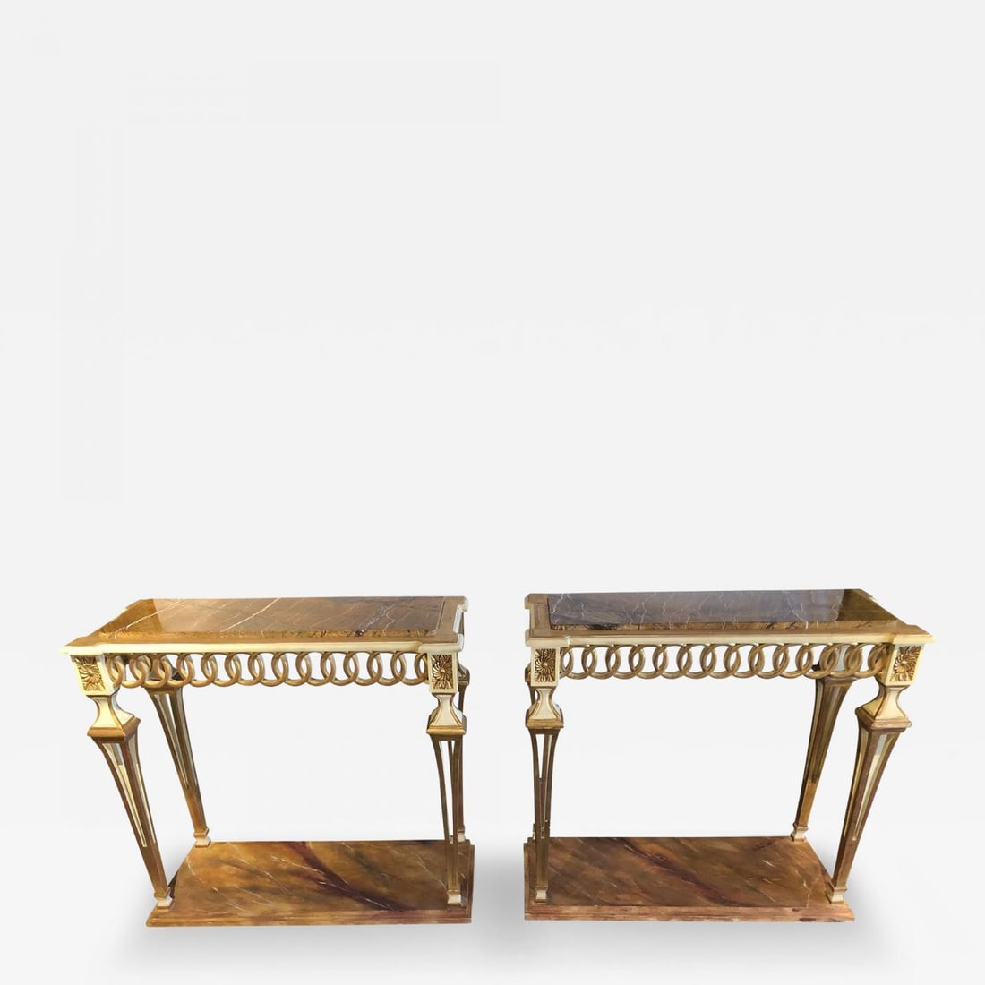 Parcel Paint and Gilt Decorated Pair of Swedish Serving or Console Tables: Description: Stunning pair of parcel paint and gilt decorated Swedish serving or console tables each having a grained marble top. The faux marble base leading to a set of paint and gilt decorated pier