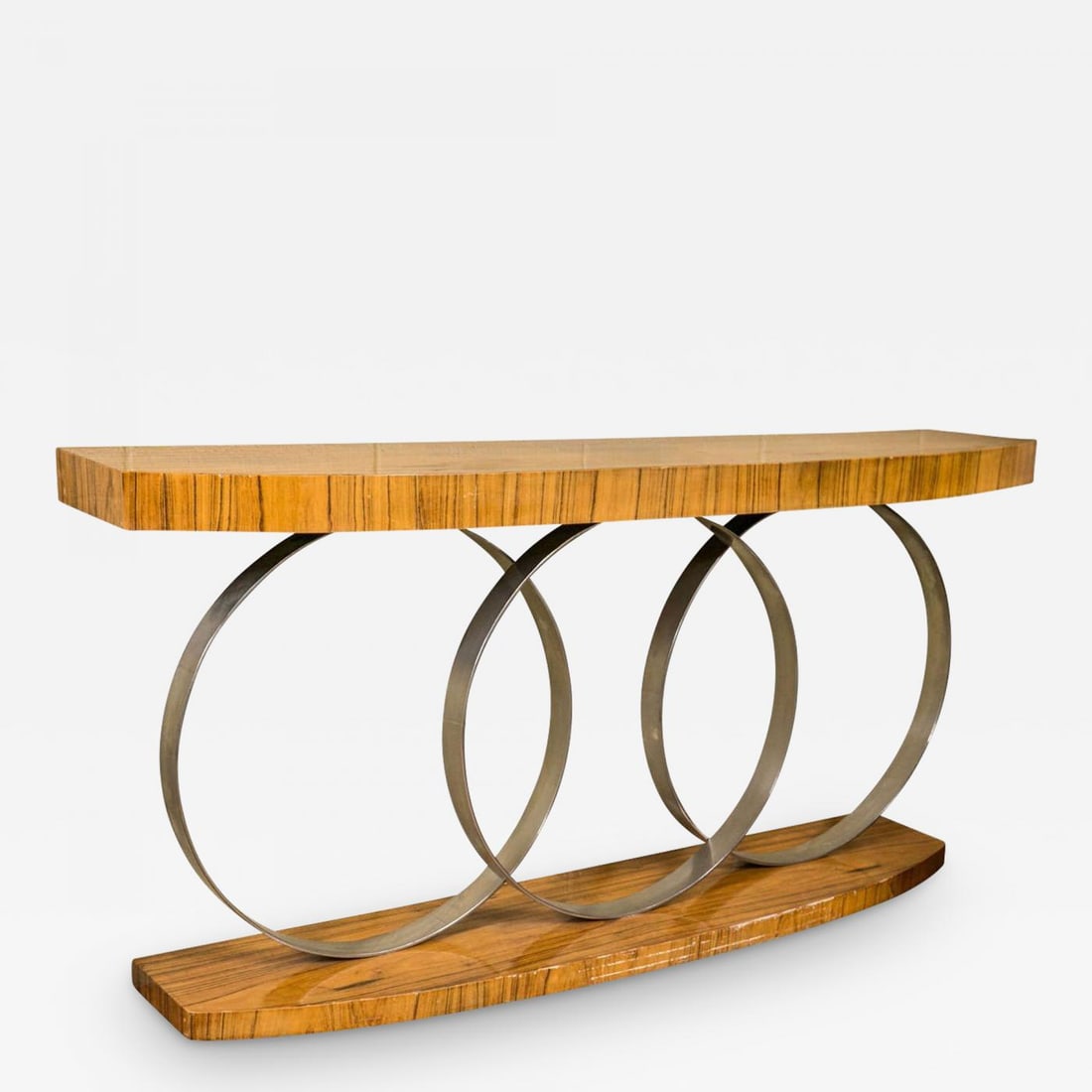 Art Deco Style Console Table Mid Century Modern Heavy Three Chrome Loops: Description: An intriguing console table in the Art Deco taste, Mid-Century Modern, the top and bottom plinths are supported and separated by three chrome loops. Very heavy. Dimensions: More Informati