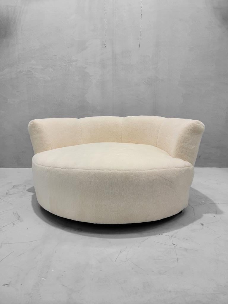 Mid Century Modern Milo Baughman Style Swivel Love Lounge Newly Upholstered: Vintage from before 2000 Mid Century Modern Milo Baughman Style Swivel Love Lounge Newly Upholstered in a High End Natural Shearling "Polar Bear"We just reupholstered this iconic swivel love seat with
