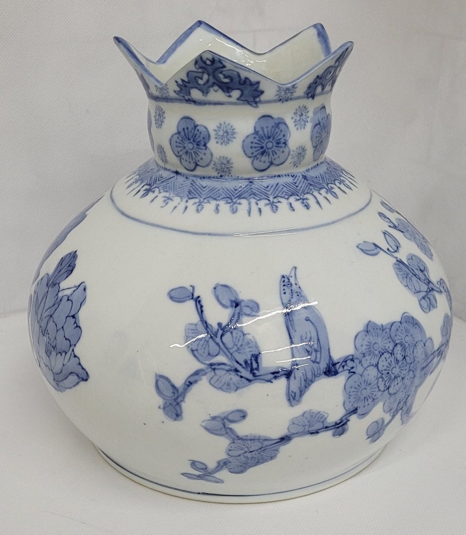 Vintage Asian Table Vase Antique Oriental Blue White Birds Unique Design: Vintage Asian Table Vase Antique Oriental Blue White Birds Unique Design In good working condition Minor wear and scratches 9"H x 8"W Reserve: $191.00 Shipping: Domestic: Shipping rates are determined