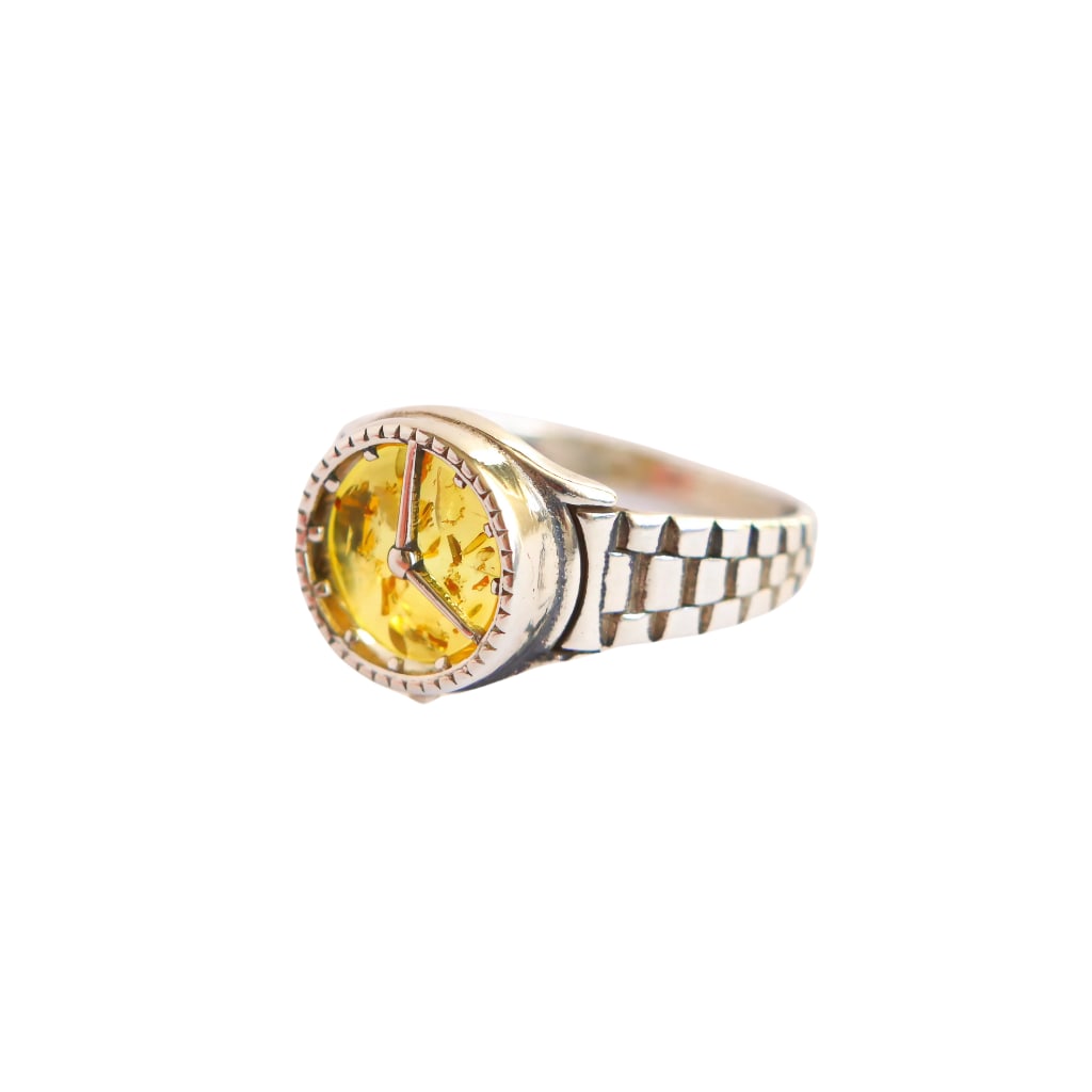 Baltic Lemon Amber Clock Ring in 925 Sterling Silver: Title: Baltic Lemon Amber Clock Ring in 925 Sterling Silver Description:Baltic Lemon Amber Clock Ring in 925 Sterling SilverBaltic Lemon Amber Clock RingAdd a whimsical touch to your jewelry collectio
