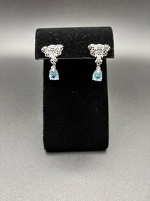Sterling Silver elephant earrings with topaz and spinel.