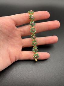 Sterling Silver gold plated bracelet with emerald and ruby.