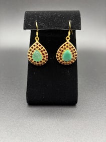 Sterling Silver gold plated earrings with emeralds and garnet.