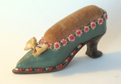 Antique miniature beaded ladies shoe pincushion.