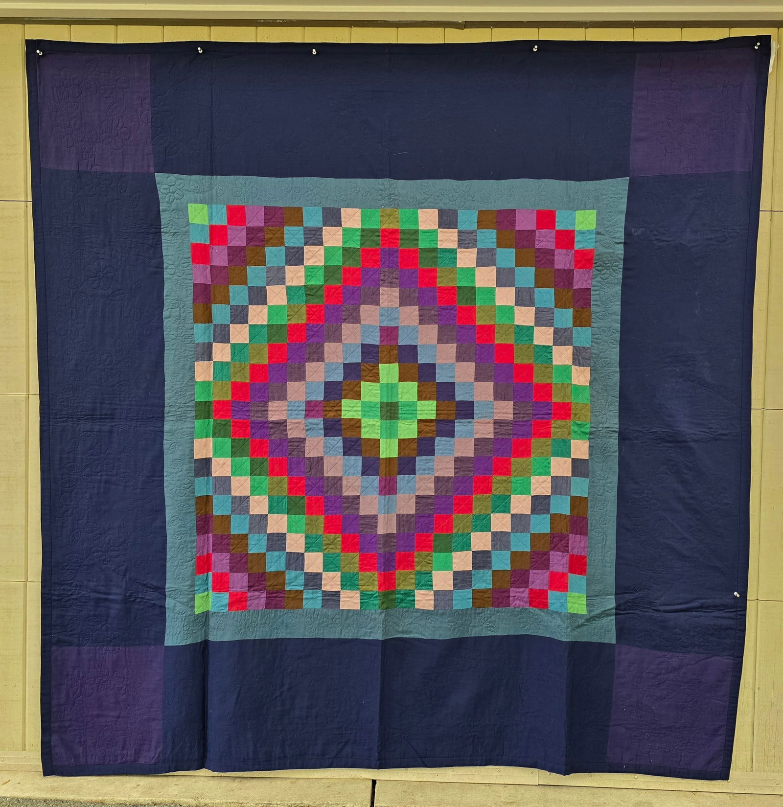 Amish quilt: Title: Amish quilt Dimension: 78 x 78 Description: Amish wool and cotton sunshine and shadow quilt ca 1950s. All wool interior with cotton borders and corner blocks. Bold interior colors with the use