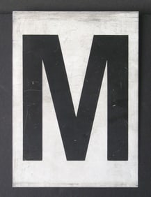 Antique tin movie marque letter “M”