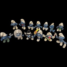 Eleven Vintage Smurf Figurines