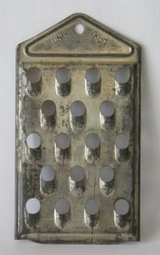 Antique small size tin kitchen food grater.