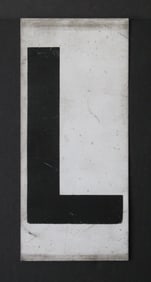 Antique tin movie marque letter “L”