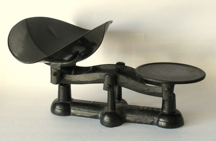Antique cast iron country store balance scale.
