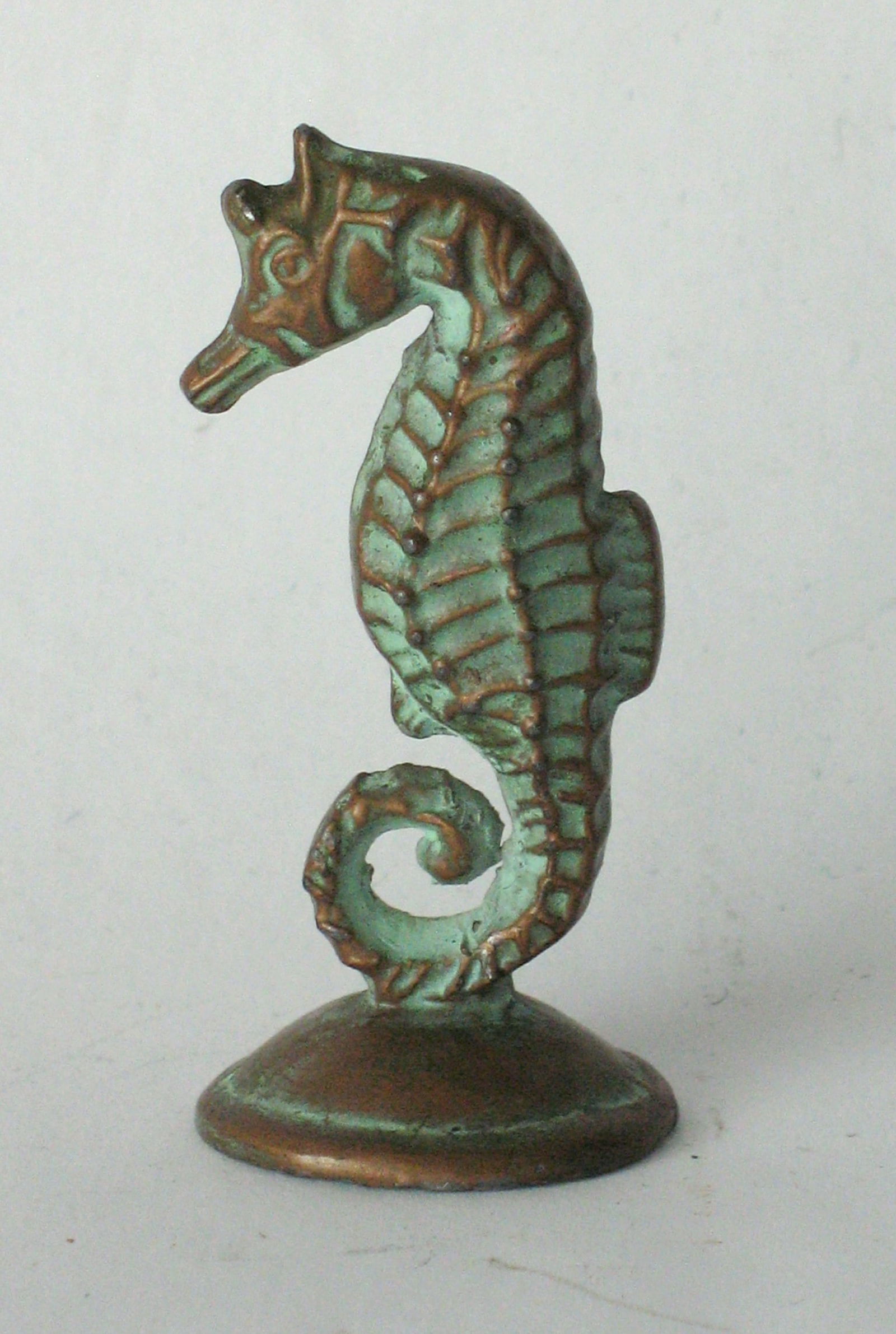 Antique cast brass seahorse paper weight. (1 of 2)