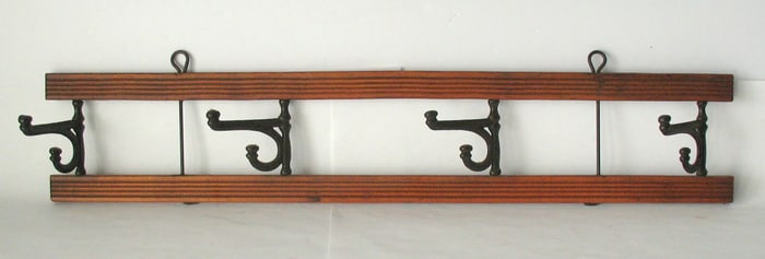 Antique wood & cast iron hat or coat rack.