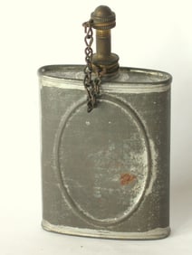 Antique tin and brass flask.