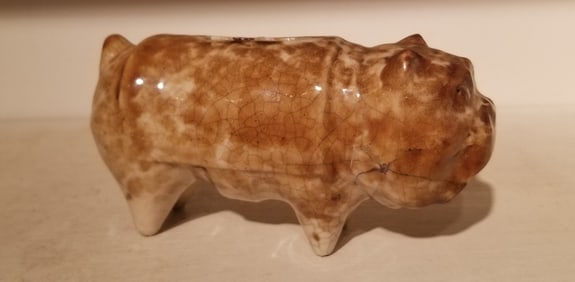 Pottery bank in the form of a bulldog