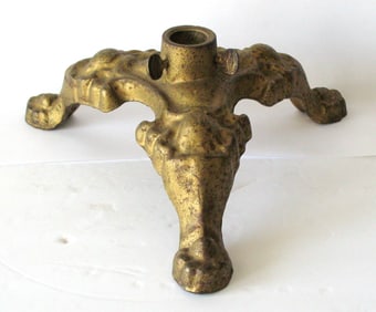 Antique cast iron flag pole base.