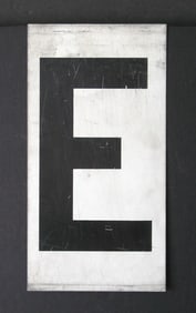 Antique tin movie marque letter “E”