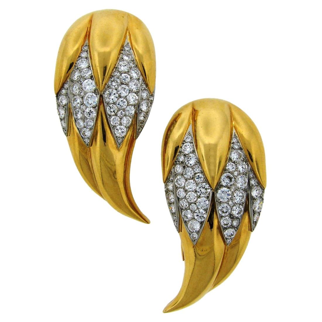 Suzanne Belperron Dents de Loup Clip Brooches Diamond Gold Platinum: About the Item A pair of magnificent double clips designed by Suzanne Belperron and manufactured by company B. Herz in Paris between 1932 and 1940. The piece comes with an authentication certificate f