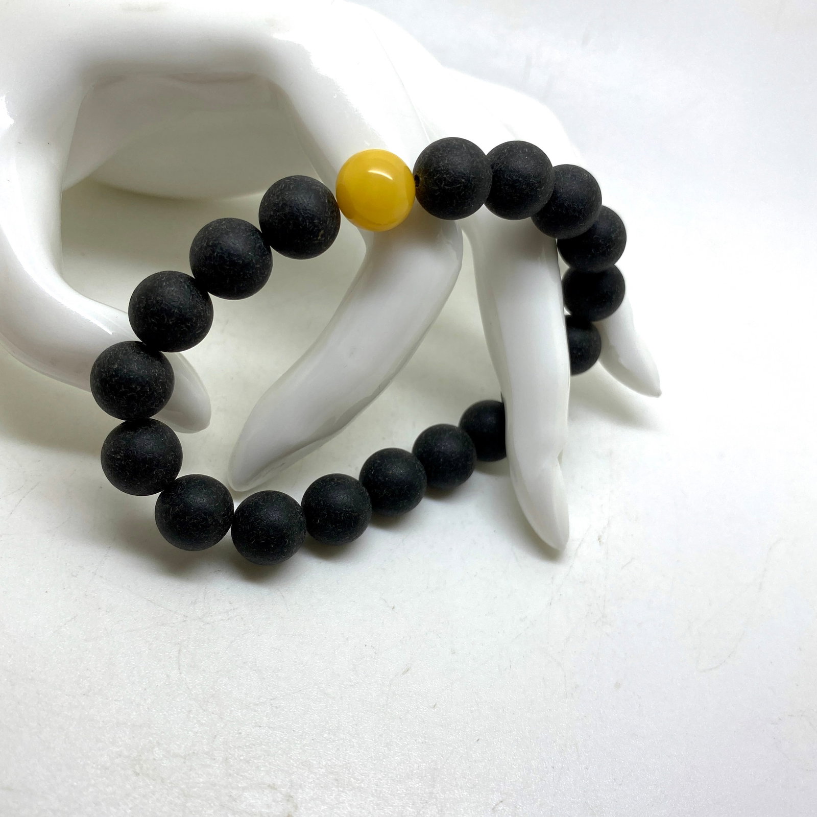 Marvellous Amber Bracelet made from Round Amber beads: Title: Marvellous Amber Bracelet made from Round Amber beads Metal: None Gemstone: Amber Size: Bead size: 11.0 mm Bead size: 0.433 inches Weight: 72 Made of: (Reconstituted Amber or Whole Stone): Reco