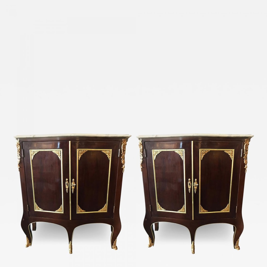 Pair of Jansen Style Double Door Marble-Top Bedside Cabinets or End Tables: Description: Pair of Jansen style oak interior two-door marble-top bedside cabinets or end tables which can easily be used as console tables. This finely constructed pair of end table or console table