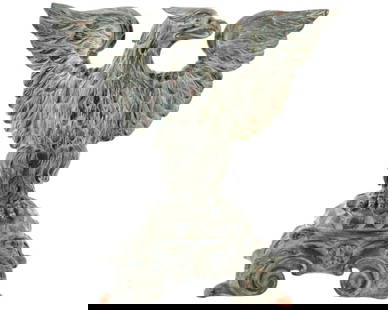 American Hand Carved Wooden Eagle Figurine: An American hand carved wooden eagle figurine on the base, expertly crafted to capture its powerful presence. Standing tall on an ornate base, this piece features intricate detailing. The figurine