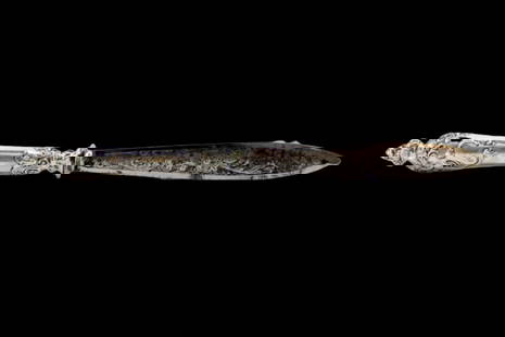 Letter opener in the shape of a knife with an embossed silver handle and masks: Description: Knife-shaped letter opener with embossed silver handle and masks. Metal: Silver. Origin: European. Brand: Unknown. Weight: 39.42 grams | 1.39 ounces. Dimensions: 22x1.7 cm | 8.66x0.67 inc
