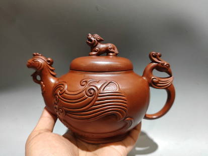 Chinese Yixing Zisha Clay Phoenix Teapot: Title: Chinese Yixing Zisha Clay Phoenix Teapot Date/Period: After2000Origin: ChineseDimension: 190x130(mm) 7.48x5.12(inches)Materials: Yixing Zisha Reserve: $288.00 Shipping:Domestic: Shipping