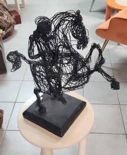 Primitive Style Vintage Brutalist wire sculpture of Horse and Rider mounted on wooden base.: Primitive Style Vintage Brutalist wire sculpture of Horse and Rider mounted on wooden base. Reserve: $300.00 Shipping: Domestic: Shipping rates are determined by destination International: Foreign shi