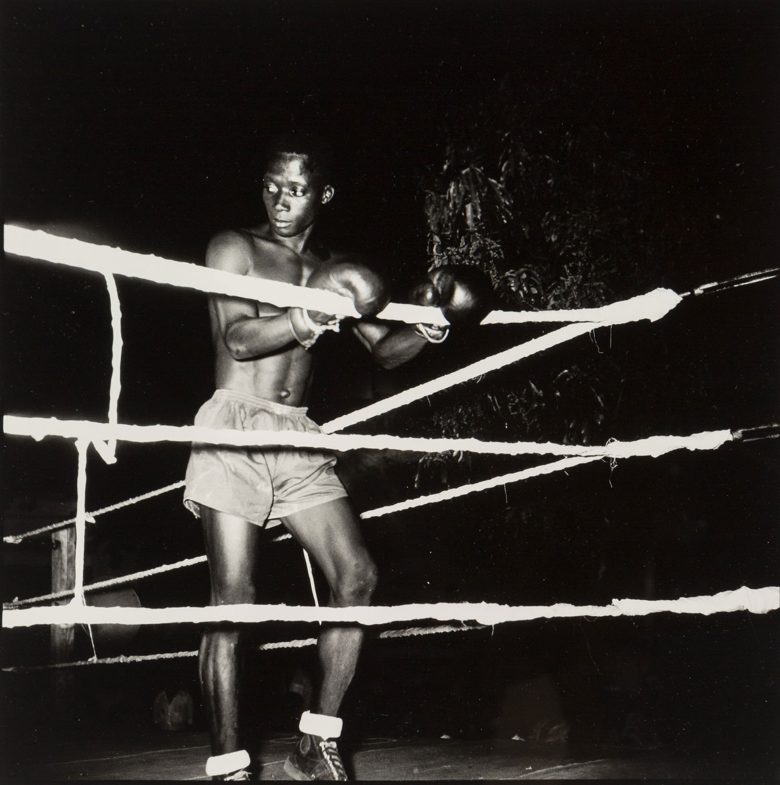 Malick Sidibe 'Grand Gallat de Boxe' Print: Description: Malick Sidibe 'Grand Gallat de Boxe' Print measuring at 16x16 inches Date: 1966 Possible Reproduction/Printed Later Reserve: $50.00 Shipping: Domestic: Flat-rate of $20.00 to anywhere wit
