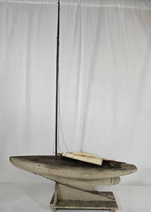 Pond boat: Title: Pond boatDimension: 30" long x 45" high overall with berth x 6.5" wide. 35" mast.Description: A late 19th century pond boat sloop with an incredible attic alligatored surface. The white second