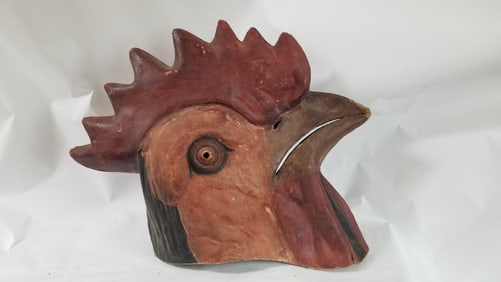 In case you need a "chicken head"...this is a costume head