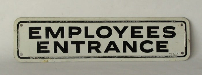 Vintage tin “Employees Only” sign.