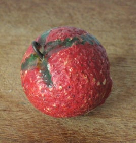 Antique stone strawberry.
