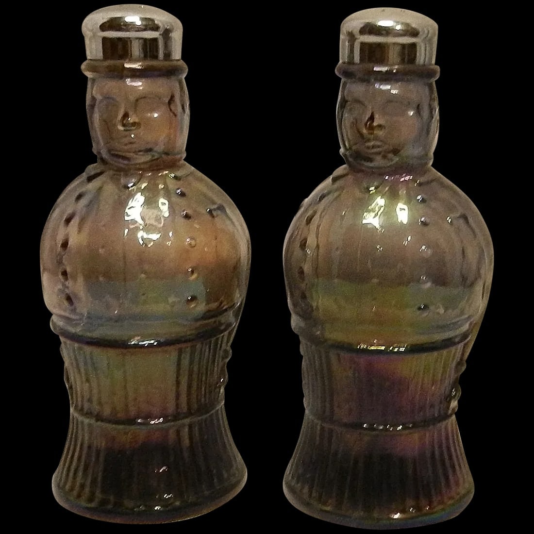 Vintage Blue Carnival Glass Salt or Pepper Shakers by Imperial Glass: Vintage smoke carnival glass men salt and pepper shakers Blue Carnival Glass Salt or Pepper Shakers by Imperial – Missing the original labels. The shakers are made by Imperial Glass Company, in 